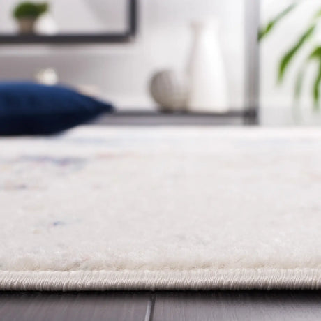 Safavieh Phoenix 500 4'-5" x 6'-5" Rug in Ivory / Blue Rust