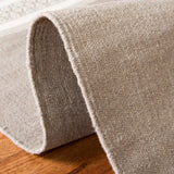 Safavieh Dhurries 5'-0" x 8'-0" Rug in Light Brown