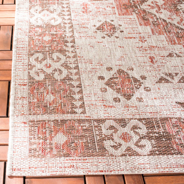 Safavieh Courtyard 5'-3" x 7'-7" Rug in Beige / Red