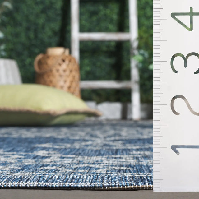 Safavieh Courtyard 5'-3" x 7'-7" Rug in Navy / Grey