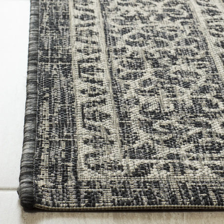 Safavieh Courtyard 5'-3" x 7'-7" Rug in Light Grey / Black