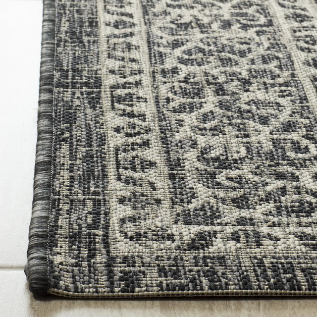 Safavieh Courtyard 5'-3" x 7'-7" Rug in Light Grey / Black