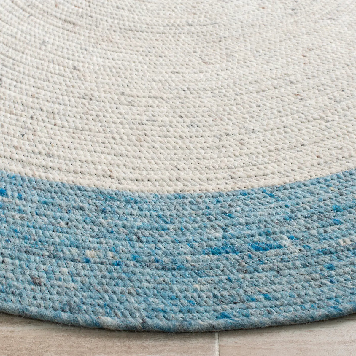 Safavieh Braided 5'-0" x 7'-0" Rug in Ivory / Blue