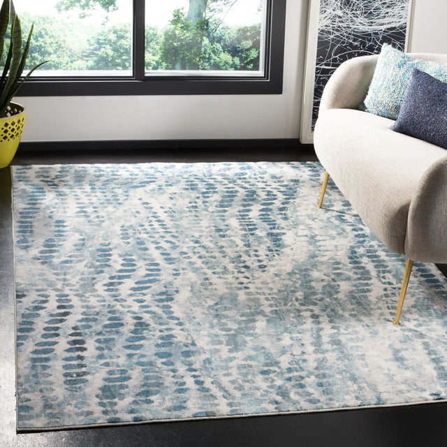 Safavieh Aria 4'-0" x 6'-0" Rug in Cream / Teal
