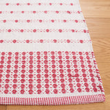 Safavieh Montauk 4'-0" x 6'-0" Rug in Red / Ivory