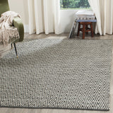 Safavieh Montauk 5'-0" x 7'-0" Rug in Ivory / Dark Grey