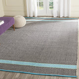 Safavieh Montauk 6'-0" x 9'-0" Rug in Turquoise / Multi
