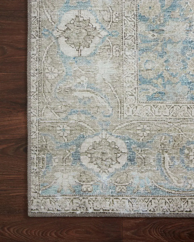 Loloi Wynter Wyn-10 Ocean/Silver Rugs - corner on wood