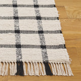 Safavieh Montauk 4'-0" x 6'-0" Rug in Ivory / Black