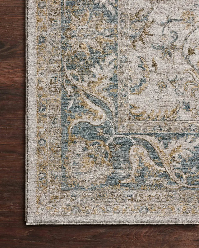 Loloi Gaia Gaa-04 Natural/Ocean Rug - corner on wood