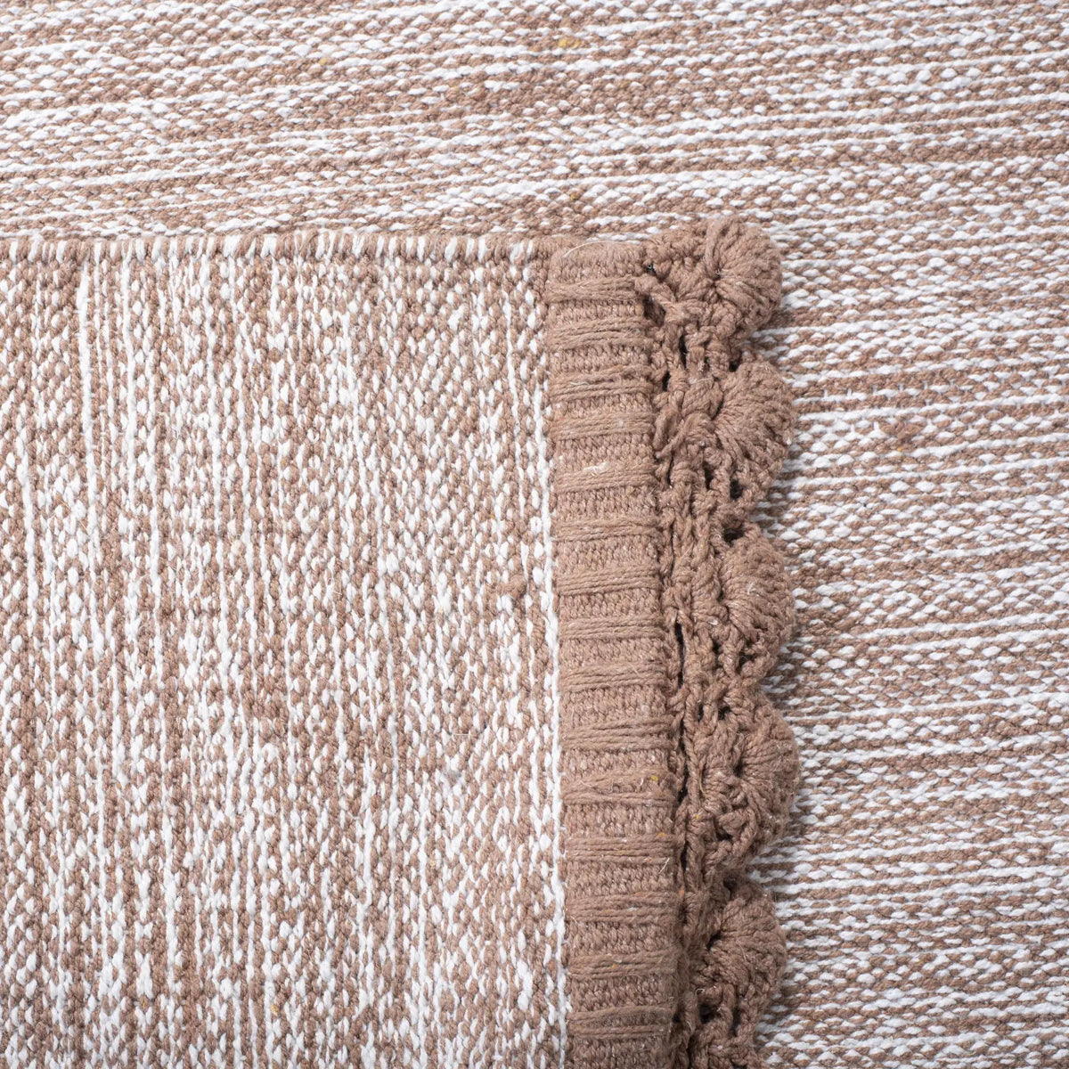 Safavieh Montauk 5'-0" x 8'-0" Rug in Brown