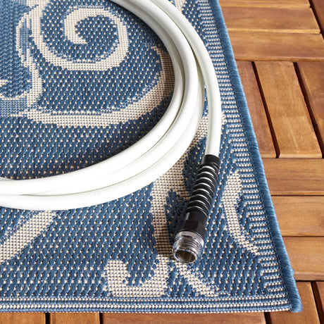 Safavieh Courtyard 5'-3" x 7'-7" Rug in Blue / Natural