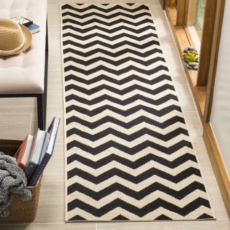 Safavieh Courtyard 2'-3" x 8'-0" Rug in Black / Beige