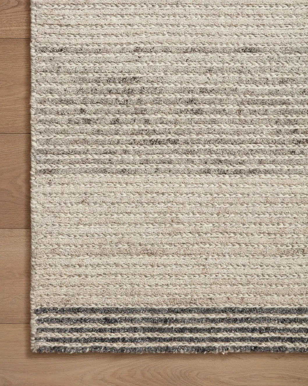 Loloi Stiles Sti-01 Dove/Ink Rug - corner on wood