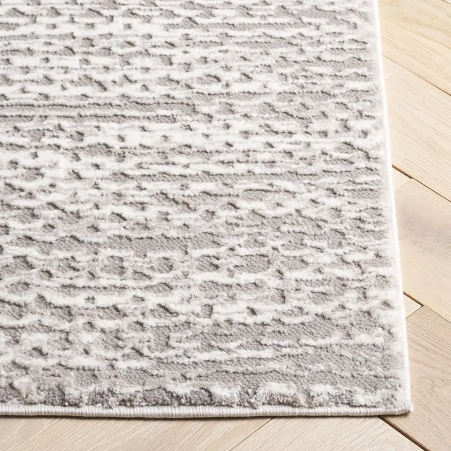 Safavieh Revive 5'-3" x 7'-7" Rug in Taupe / Ivory