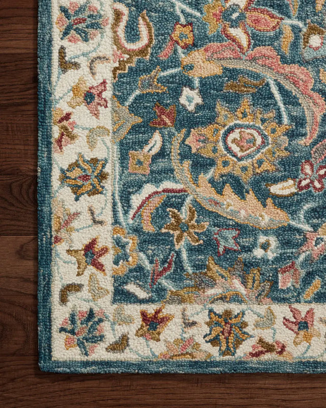 Loloi Victoria Vk-24 Ocean/Multi Rug - corner on wood