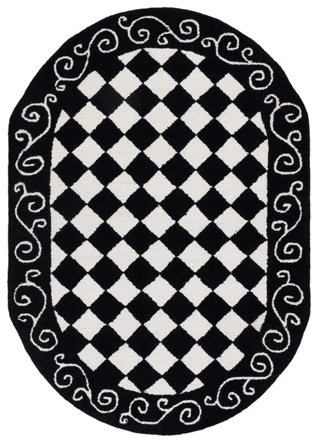 Safavieh Chelsea 4'-6" x 6'-6" Rug in Black / Ivory
