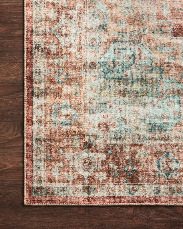 Loloi Heidi Hei-01 Terracotta/Aqua Rugs - corner on wood