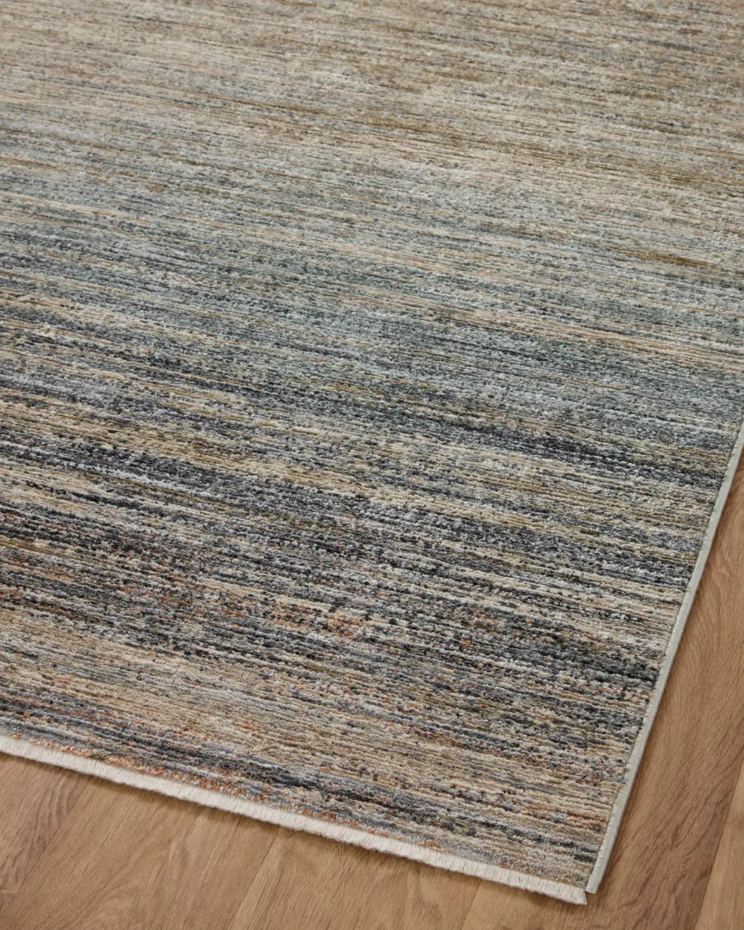 Loloi Soho Soh-02 Earth/Multi Rug - angled corner on wood