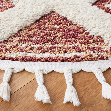Safavieh Moroccan Tassel Shag 5'-3" x 5'-3" Rug in Rust / Ivory