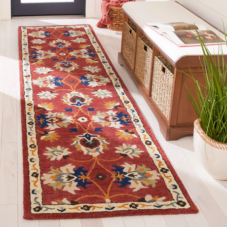 Safavieh Micro-Loop 2'-3" x 9'-0" Rug in Rust / Blue