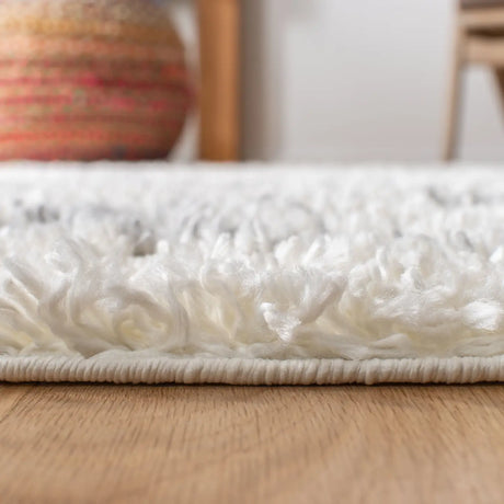 Safavieh Moroccan Tassel Shag 5'-3" x 7'-6" Rug in Ivory / Light Grey