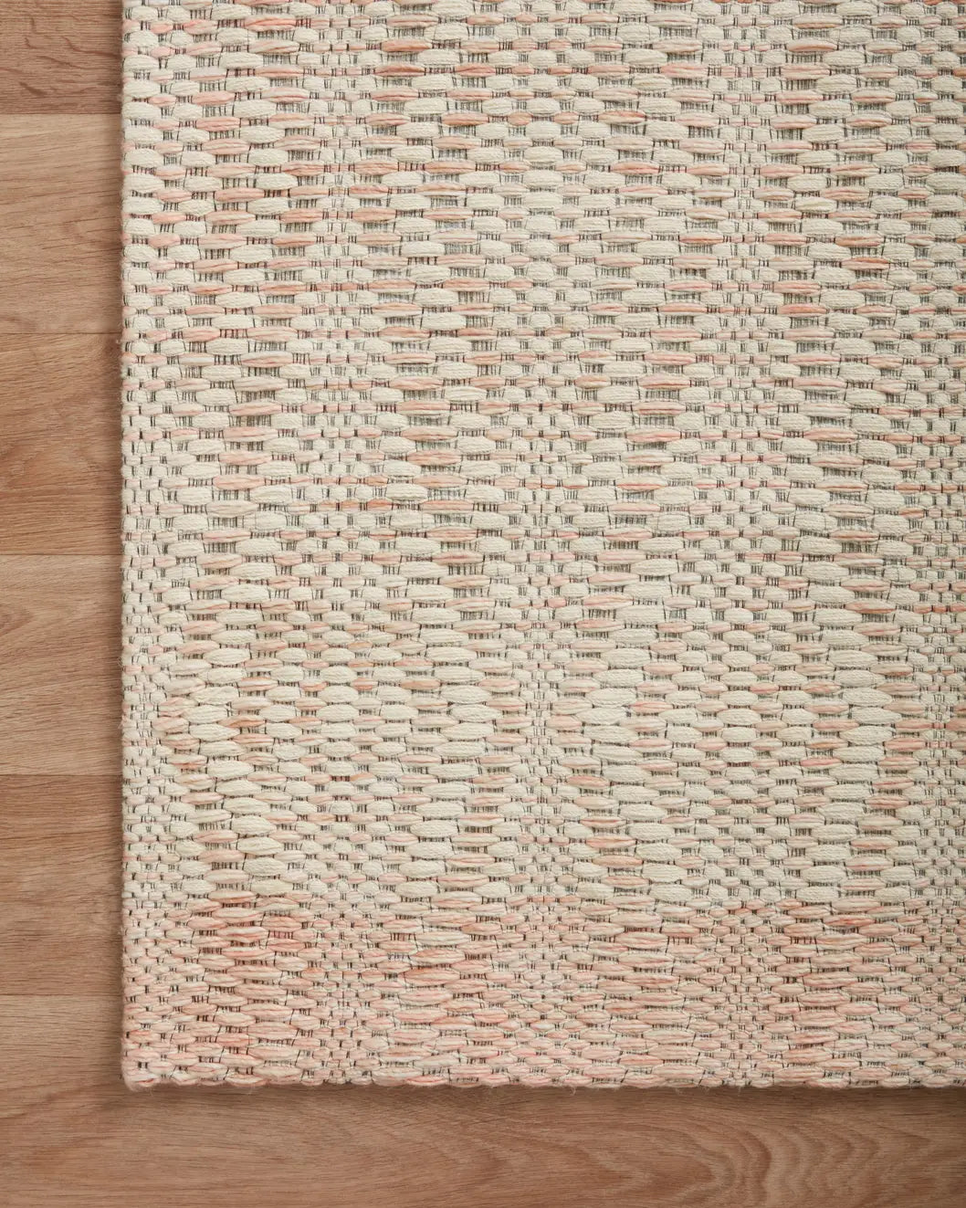 Loloi Kenzie Knz-01 Ivory/Blush Rugs - corner on wood
