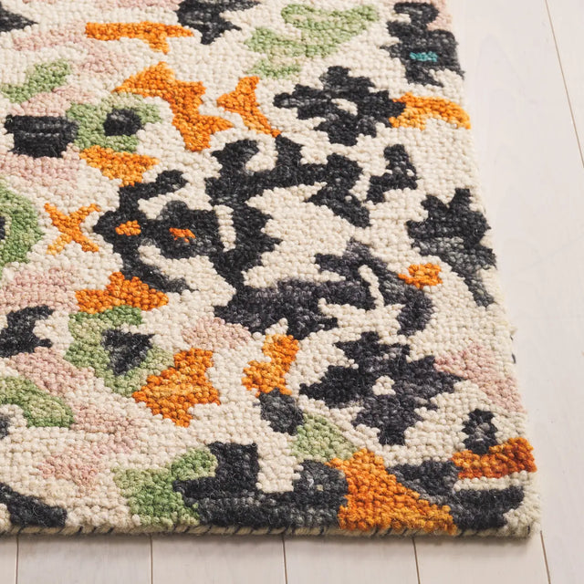 Safavieh Aspen 4'-0" x 6'-0" Rug in Ivory / Pink