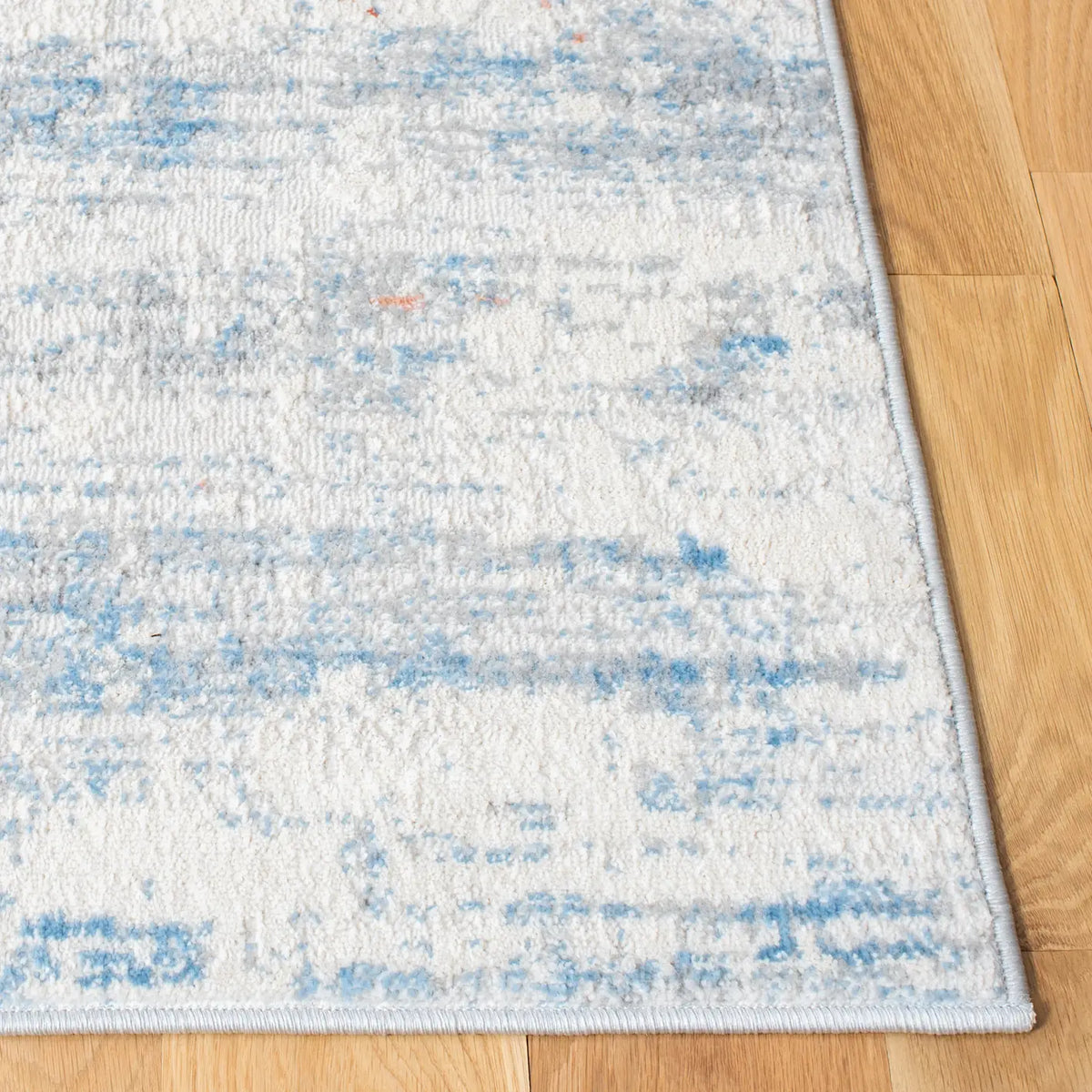 Safavieh Amelia 4'-5" x 6'-5" Rug in Ivory / Rust