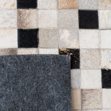Safavieh Studio Leather 4'-0" x 6'-0" Rug in Ivory / Black