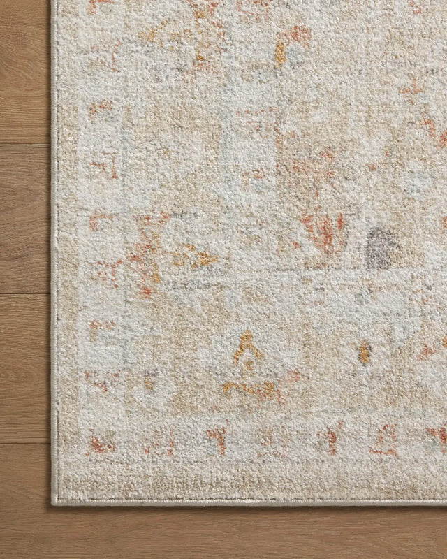 Loloi Monroe Mon-05 Sand/Sunrise Rug - corner on wood