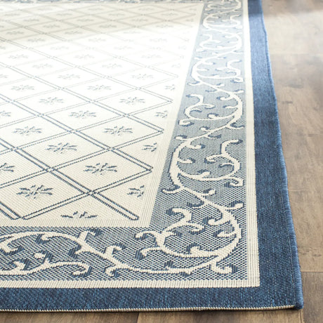 Safavieh Courtyard 4'-0" x 5'-7" Rug in Beige / Navy