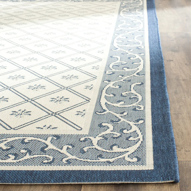 Safavieh Courtyard 4'-0" x 5'-7" Rug in Beige / Navy