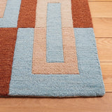 Safavieh Genre 4'-0" x 6'-0" Rug in Light Blue / Rust