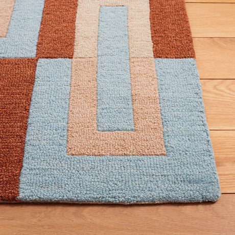 Safavieh Genre 4'-0" x 6'-0" Rug in Light Blue / Rust