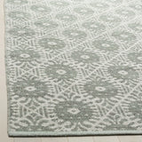 Safavieh Montauk 5'-0" x 8'-0" Rug in Light Green / Ivory