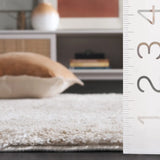 Safavieh Penelope Shag 4'-0" x 6'-0" Rug in Beige / Ivory