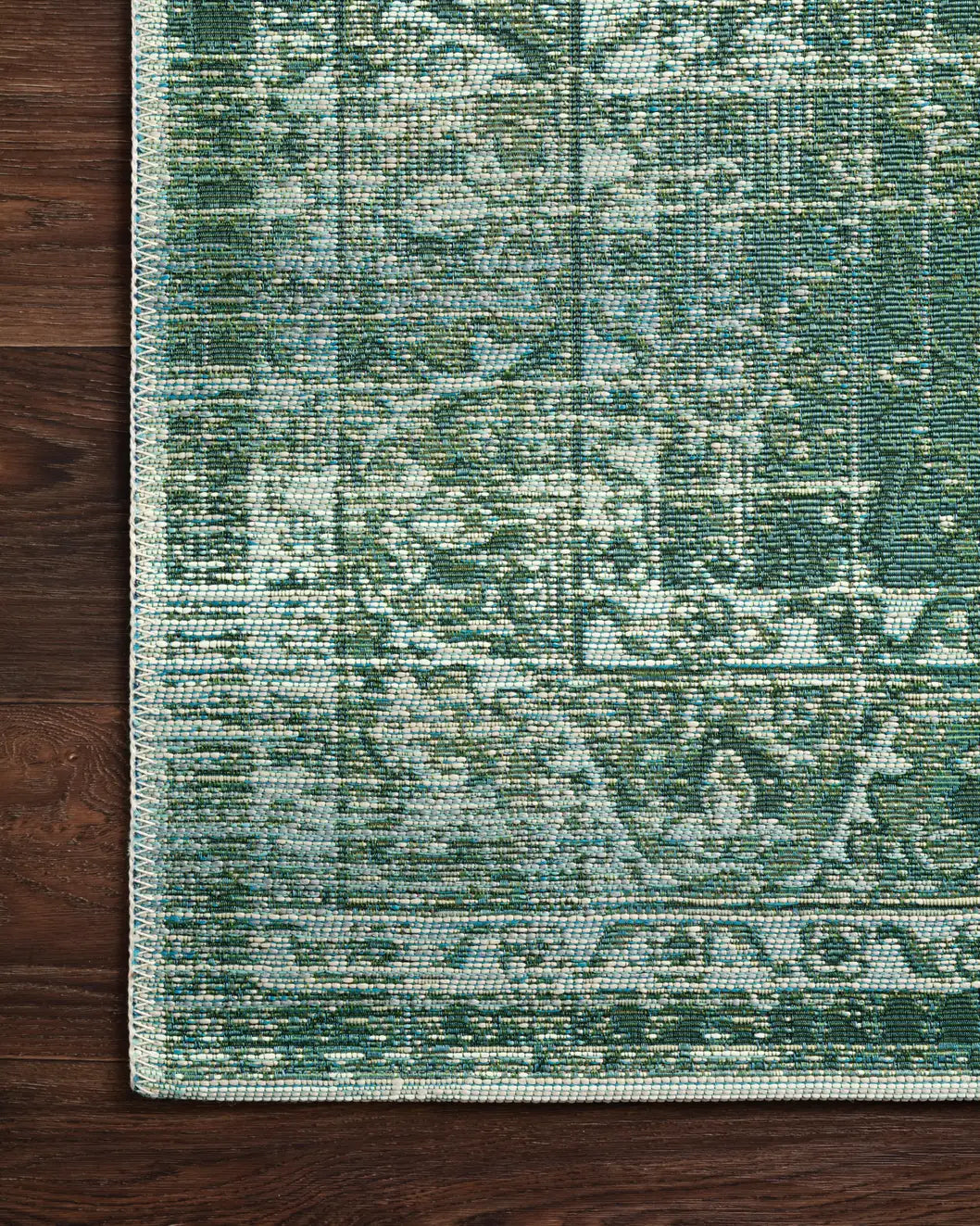 Loloi Mika Mik-06 Green / Mist Rugs - corner on wood