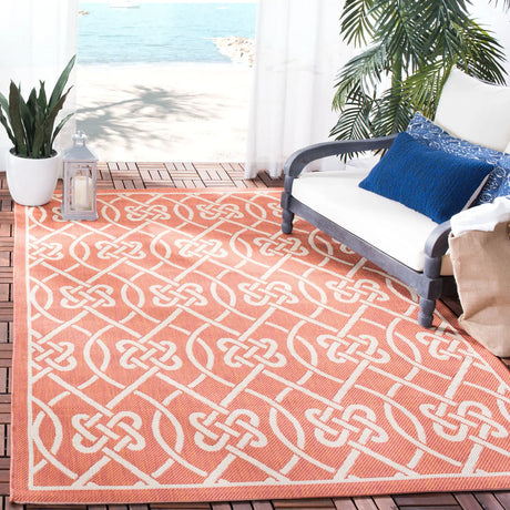 Safavieh Courtyard 5'-3" x 7'-7" Rug in Terracotta / Light Beige