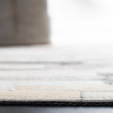 Safavieh Studio Leather 4'-0" x 6'-0" Rug in Ivory / Grey