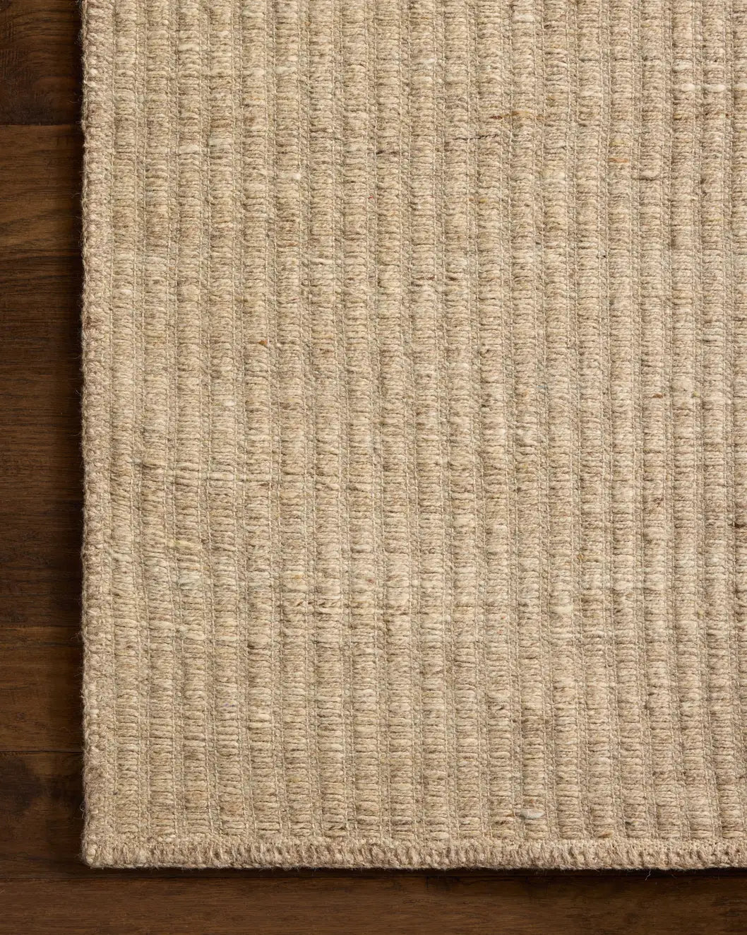 Loloi Elma ELM-01 Contemporary Hand Woven Natural Rug - corner on wood