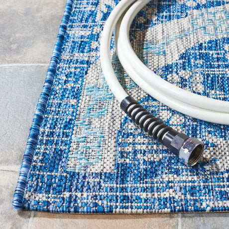 Safavieh Courtyard 5'-3" x 7'-7" Rug in Navy / Grey