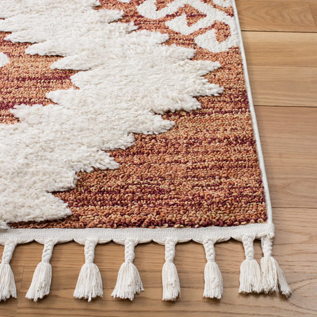 Safavieh Moroccan Tassel Shag 4'-0" x 6'-0" Rug in Orange / Ivory