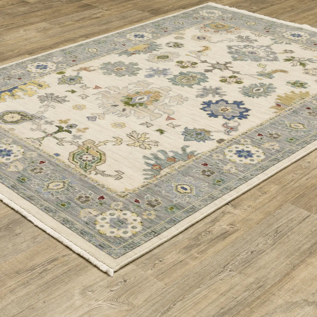 Oriental Weavers Lucca 846H1 Ivory/ Blue Rug - angle detail