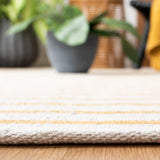 Safavieh Montauk 4'-0" x 6'-0" Rug in Ivory / Gold