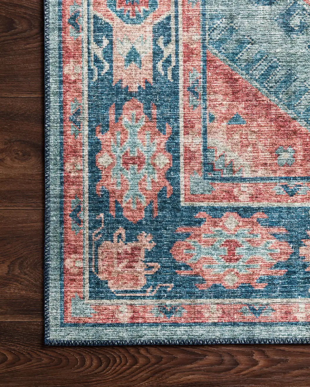 Loloi Skye Sky-03 Turquoise/Terracotta Rugs - corner on wood