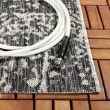 Safavieh Courtyard 6'-7" x 9'-6" Rug in Black / Beige
