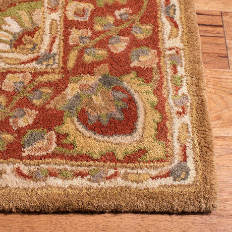 Safavieh Heritage 4'-0" x 6'-0" Rug in Beige / Rust