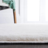 Safavieh Faux Rabbit Fur 5'-0" x 7'-0" Rug in Off White