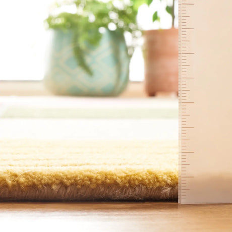Safavieh Genre 4'-0" x 6'-0" Rug in Beige / Green